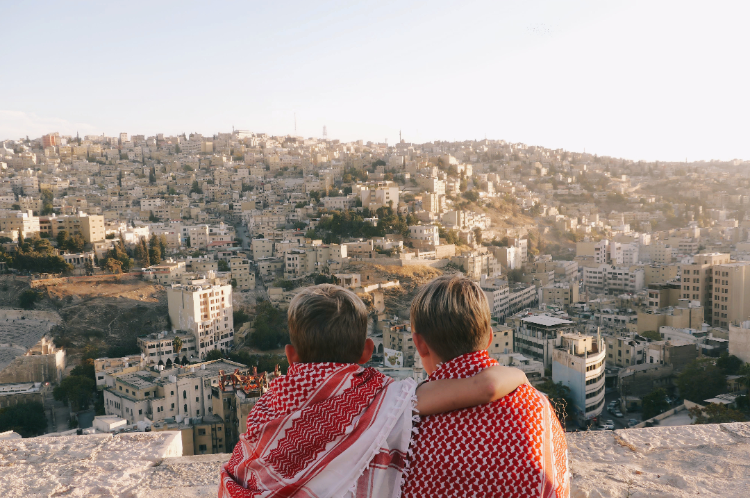 Boys the enjoying Amman skyline atop Amman Citadel.